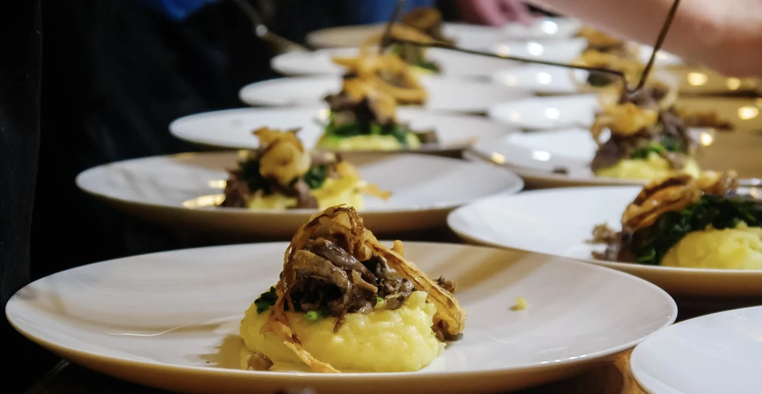 Beautifully plated courses prepared for a private dinner